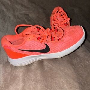 Nike Pink Athletic Shoes with Sleek Design